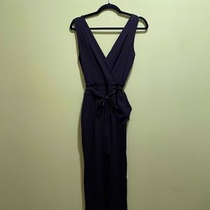 Black jumpsuit from Ross. Pants have splits on the sides. Size S